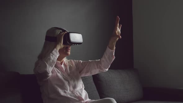 Senior woman in VR headset