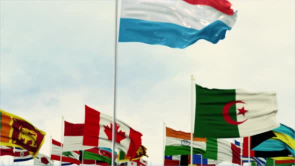 Luxembourg Flag With World Globe Flags Morning Shot alt