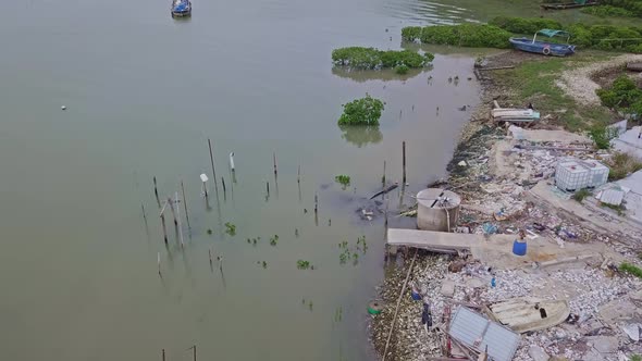 A dynamic aerial footage of the lake of the fishing village in Lau Fau Shan in the New Territories o