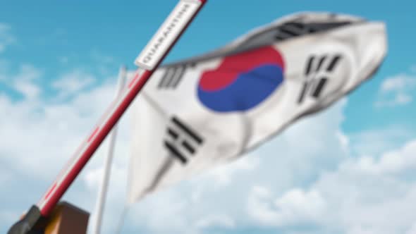 Closed Gate with QUARANTINE Sign on the Korean Flag Background