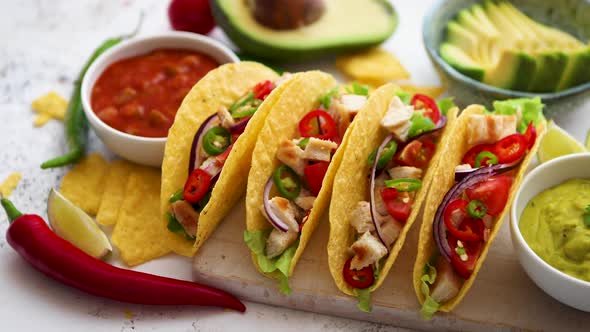 Tasty Mexican Meat Tacos Served with Various Vegetables and Salsa