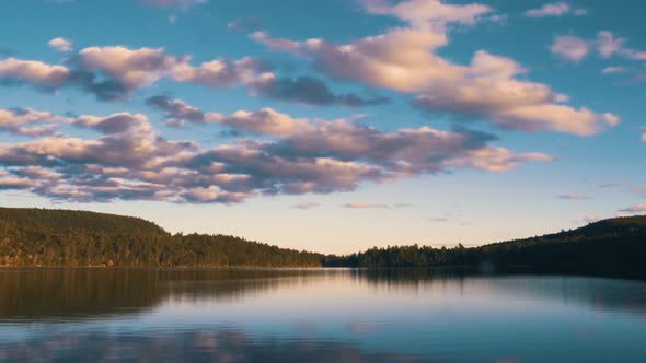 Dramatic Time Lapse of Clouds Over Empty Lake During Golden Hour