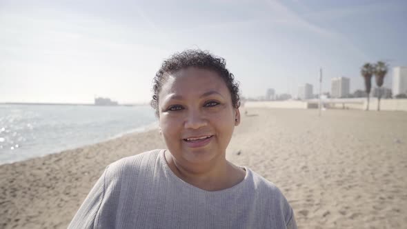 Portrait Happy Old Middle Aged Grandmother Latin Woman Laughing Enjoying Successful Beach Lifestyle