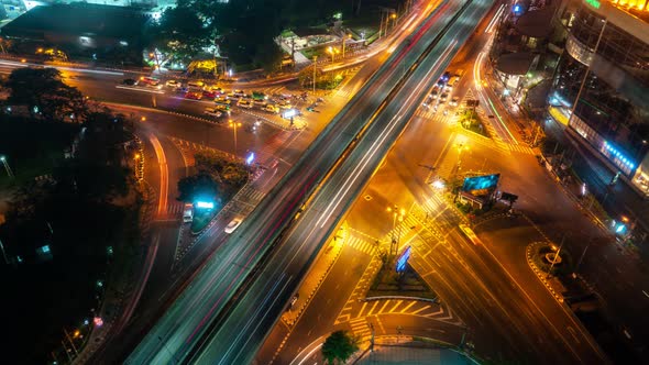 Time Lapse of Busy Highway Road Junction in Metropolis City Center at Night