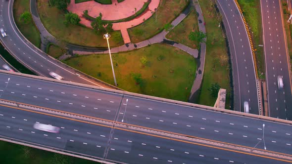 4K : Aerial drone hyperlapse video of elevated toll road junction,