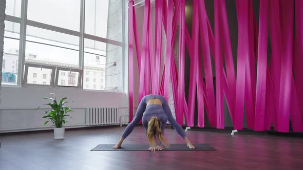 Woman Doing Yoga in Studio
