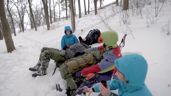 A Team of Young People Made a Halt During the Hike