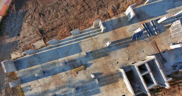 Aerial View Construction of a Multistorey Apartment Building are Work Along the Building in Progress