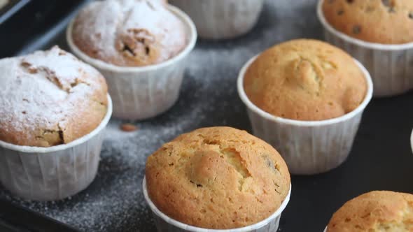 Freshly Baked Muffins Sprinkled With Powdered Sugar.