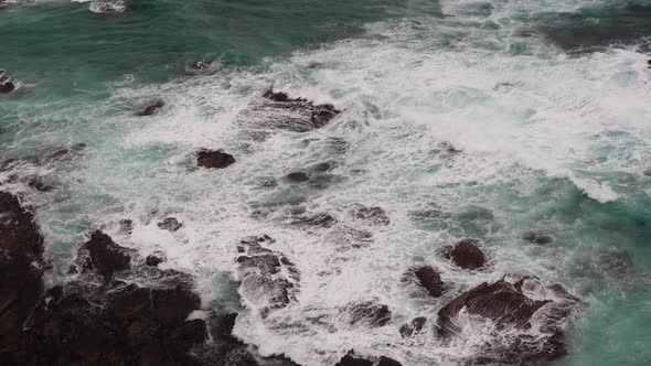 Peaceful calming Footage of beautiful blue ocean waves crashing the rocky shore at Loch Ard Gorge 12