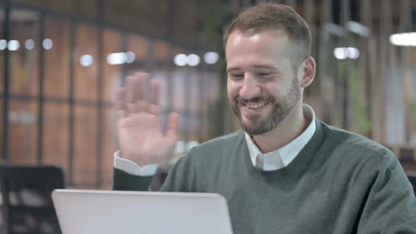 Close Up Shoot of Handsome Man Doing Video Chat on Desktop