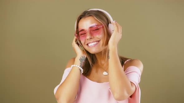 Female in Sunglasses and Pink Dress