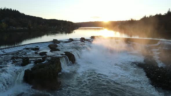 Flying Over Beautiful Waterfalls and Sunset