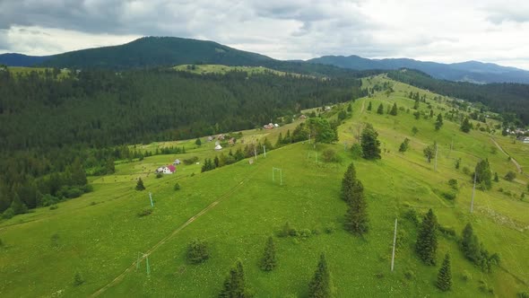 Drone flight over the Ukrainian Carpathians in summer. Fascinating landscapes in the mountains. Immo