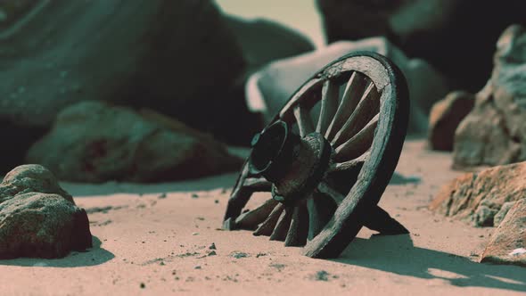 Old Wooden Cart Wheel at Sand Beach