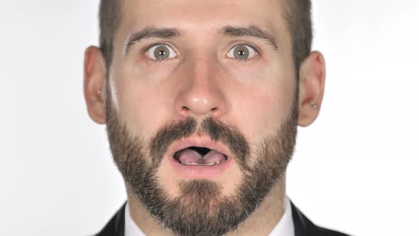 Close Up of Shocked, Wondering Beard Businessman Face