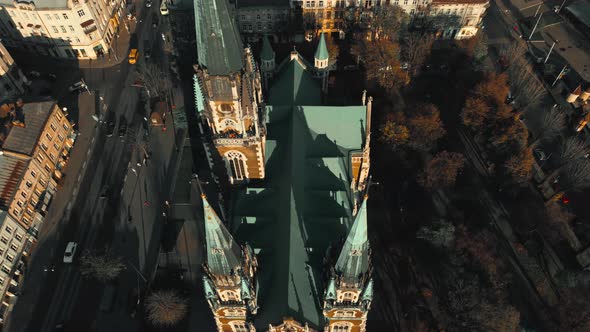 Drone Aerial View Over Roof and Spires of Church of St