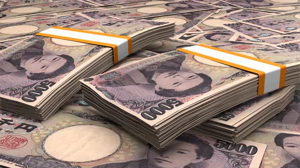 5000 Japanese yen money composition. Financial background. Many banknotes and wads of money.
