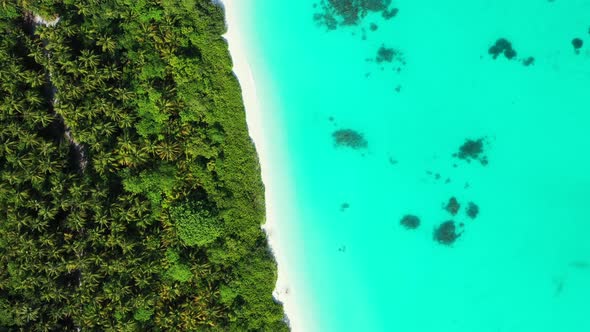 Luxury fly over travel shot of a paradise sunny white sand beach and blue ocean background in best q