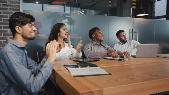 Happy Young Multiethnic Employees Sit in Office Listen Training Diverse Joyful Business People