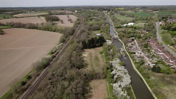 Hatton Locks Narrow Boat In Canal And Train On Railway Line Spring Season Aerial View Grand Union Lo