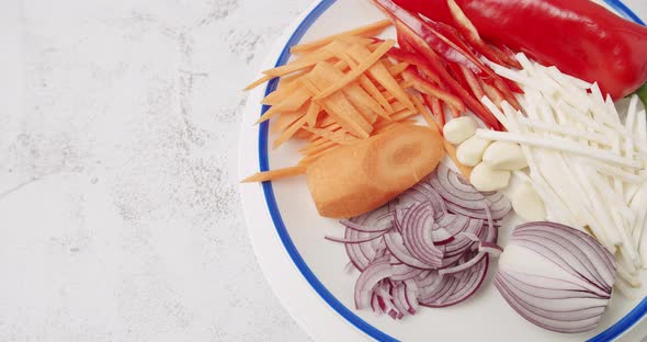 Variety of Vegetables on Rotating White Plate