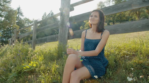 Woman Enjoying the Summer Alpine Nature