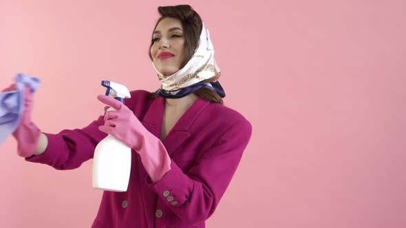 A Stylish Pinup Woman Washes Windows with Gloves