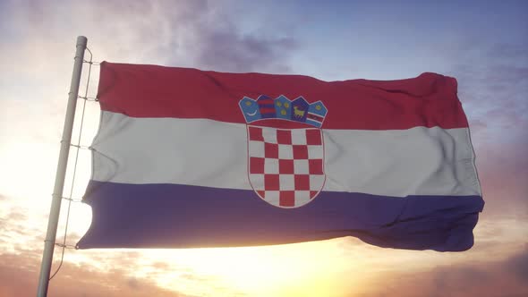 Flag of Croatia Waving in the Wind Sky and Sun Background