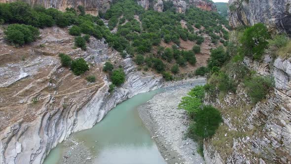 Large river in between mountains in Albania