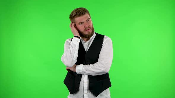 Man Thinks About Something. Green Screen