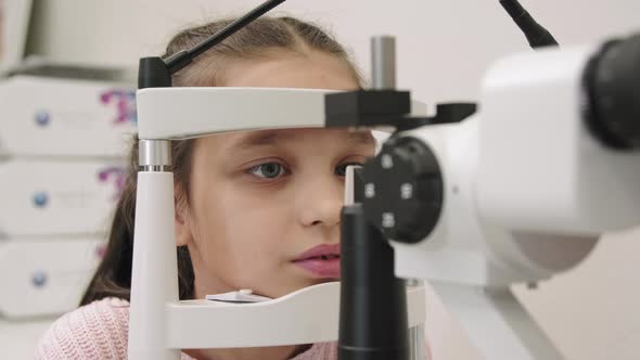 Little Girl At Oculist Office