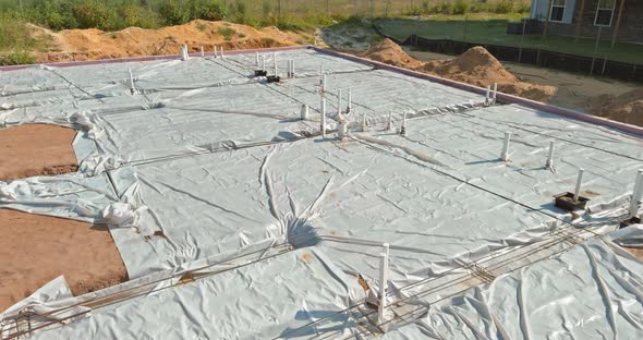 Laying in the Ground PVC Pipes Before Pouring Concrete