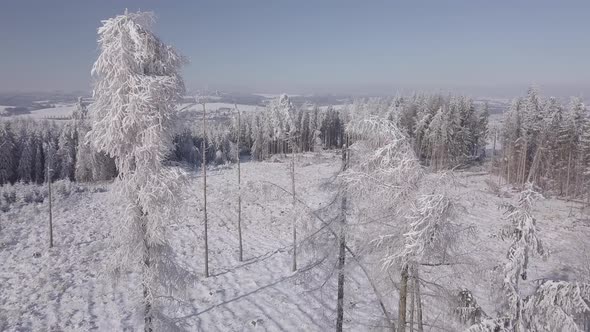 White frozen and snowy winter landscape from bird eye