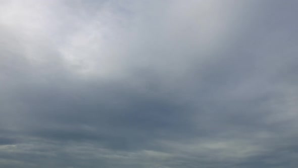 Time lapse of white cloud moving pass around sky background