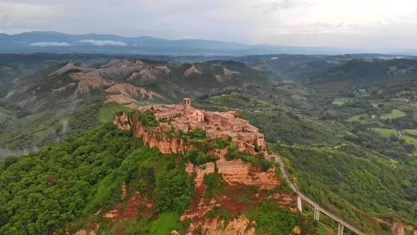 Civita Di Bagnoregio, Italy, Flying By the Town Among Green Flora and Hills in Central Italy