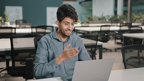 Millennial Man Indian Businessman Using Video Conference App Greeting Employees Waving Hand Hello