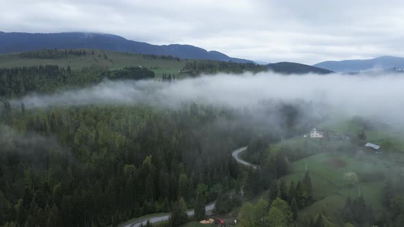 Ukraine, Carpathians: Fog in the Mountains. Aerial.