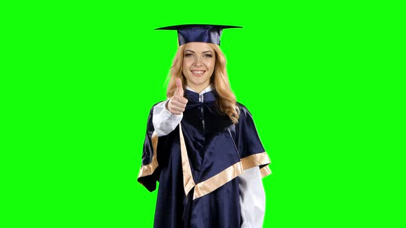 Graduate with a Thumbs Up Sign. Green Screen
