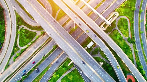 drone flying over interchange and multi junction road