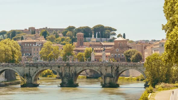 Saint Angelo Bridge Surrounded By Lush Green Trees in Rome