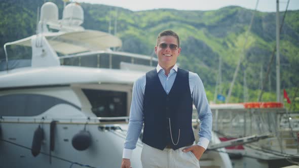 Caucasian man standing in marina