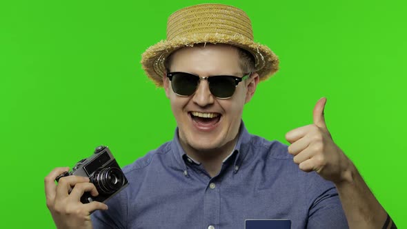 Portrait of Young Man Tourist Photographer Giving Thumbs Up. Chroma Key
