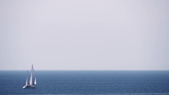 Scene with Sky, Sea and Sailing Yacht