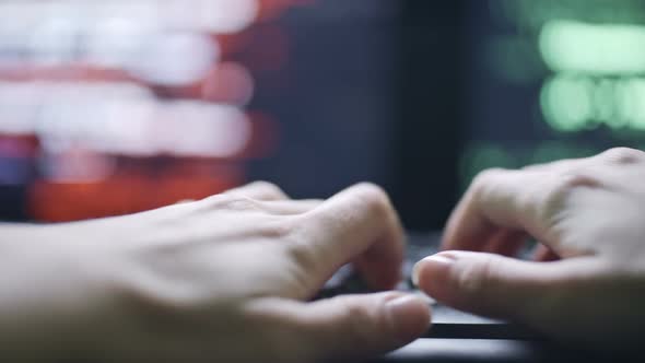 Hands of Female Hacker Typing on Black Keyboard