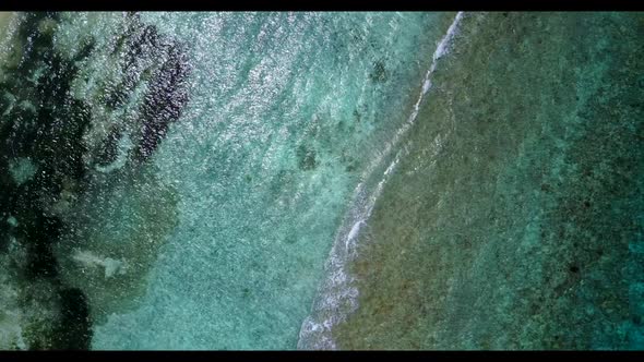 Aerial top view seascape of idyllic island beach trip by transparent water and clean sandy backgroun