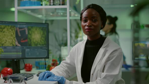 Closeup of African Biologist Woman Looking Into Camera