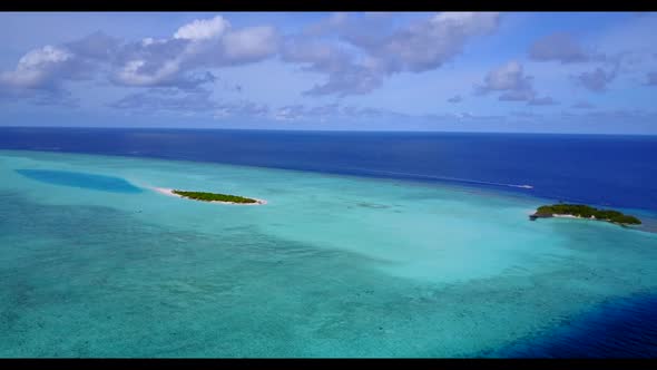 Aerial sky of exotic island beach voyage by clear lagoon with white sand background of journey near 