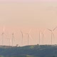 Cloudy yellow sky with windmill turbine for generate renewable energy on landscape - VideoHive Item for Sale