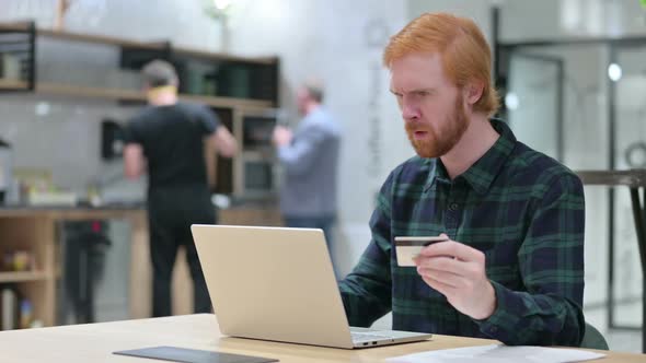 Online Payment Failure on Laptop By Beard Redhead Man